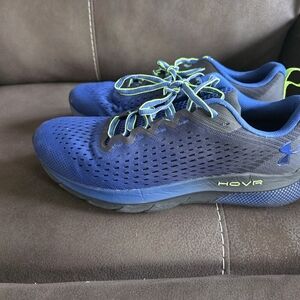 Under Armour Men's Blue and Neon Green Athletic Hovr turbulence tennis shoes.
